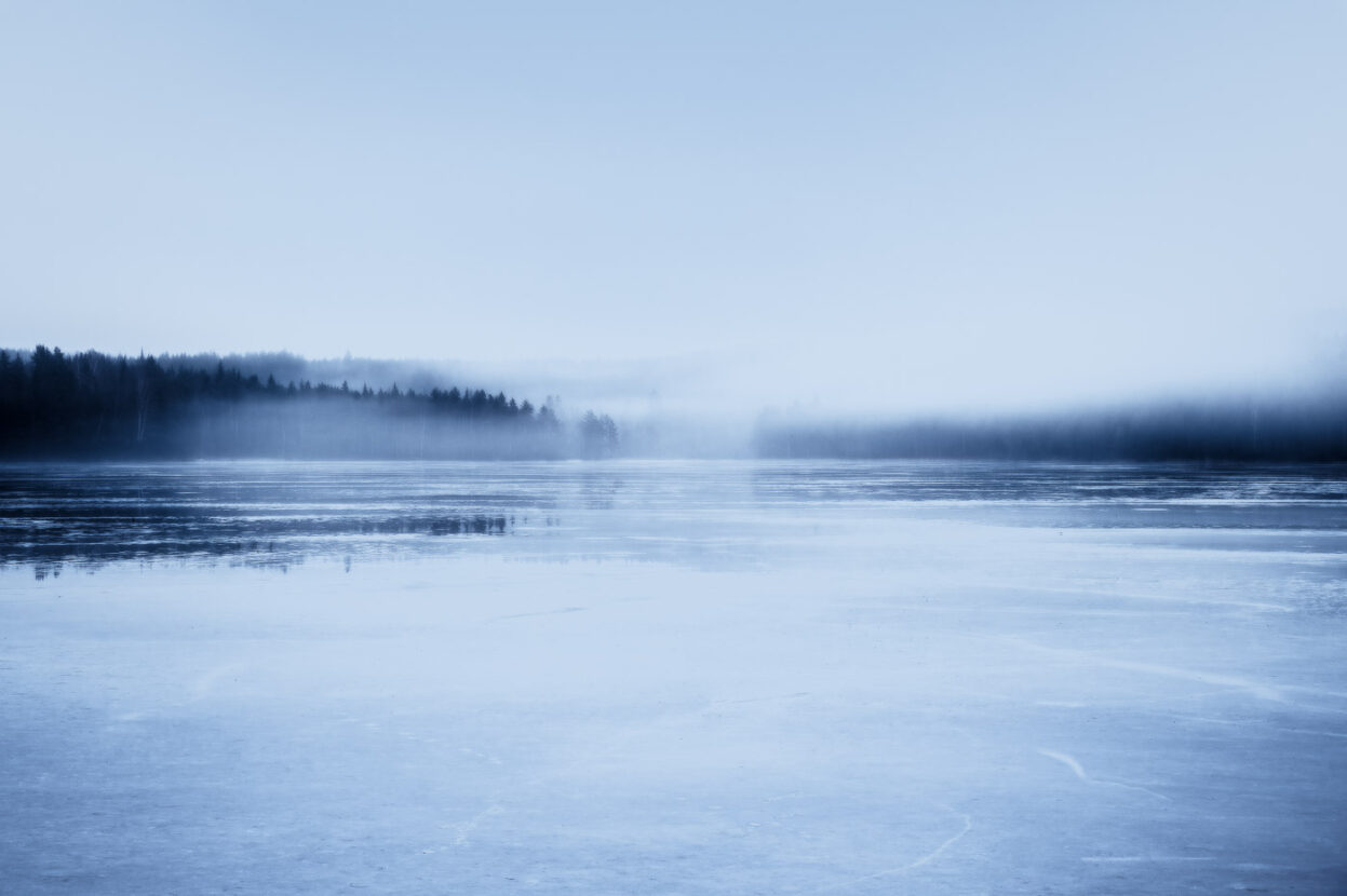 Misty lake scape blue tones