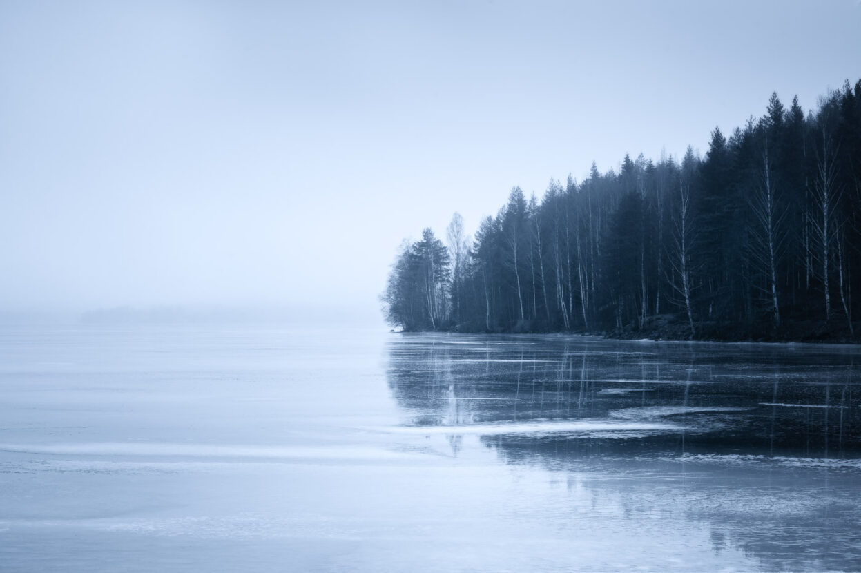 Ice covers the Ljusnaren lake during the cold Swedish winter